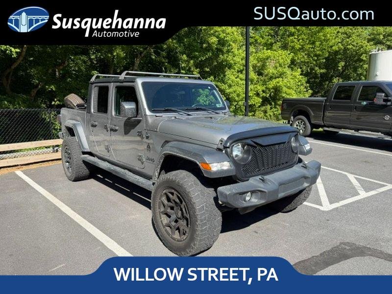 Used 2020 Billet Silver Metallic Clearcoat Jeep Sport S image 1