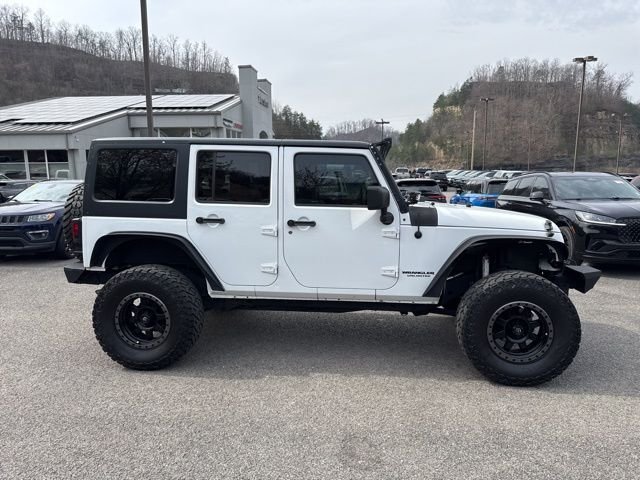 Used 2013 Jeep Wrangler Unlimited Sport with VIN 1C4BJWDG3DL669898 for sale in Hazard, KY