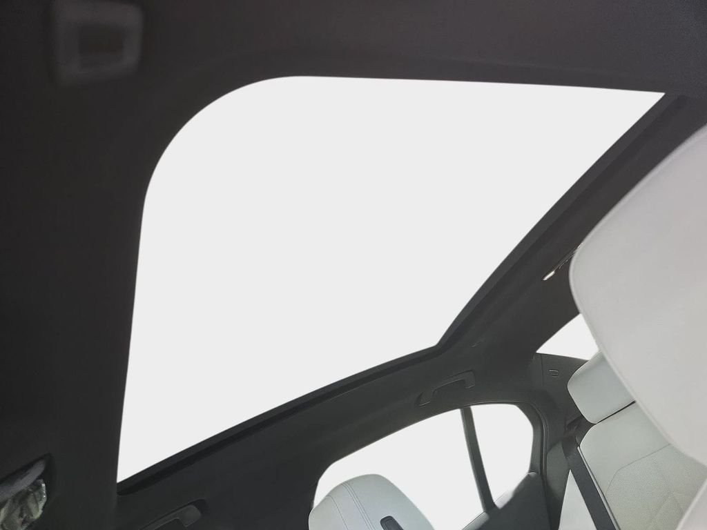New 2027 Mineral White Metallic BMW 550e xDrive image 14