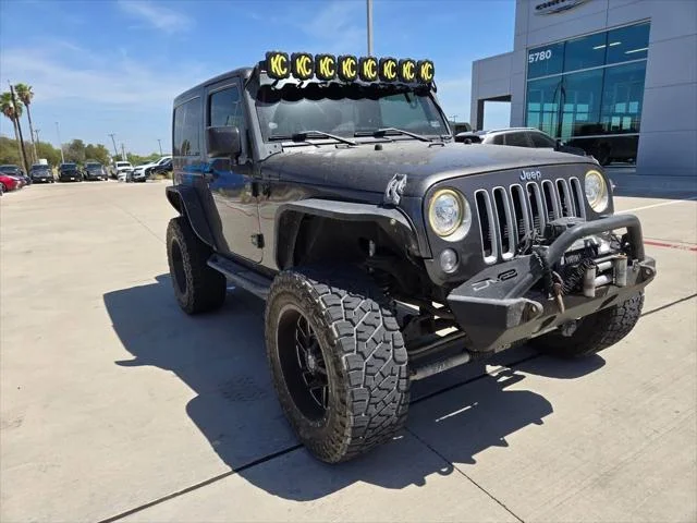 Used 2017 Gray Jeep Sahara image 1