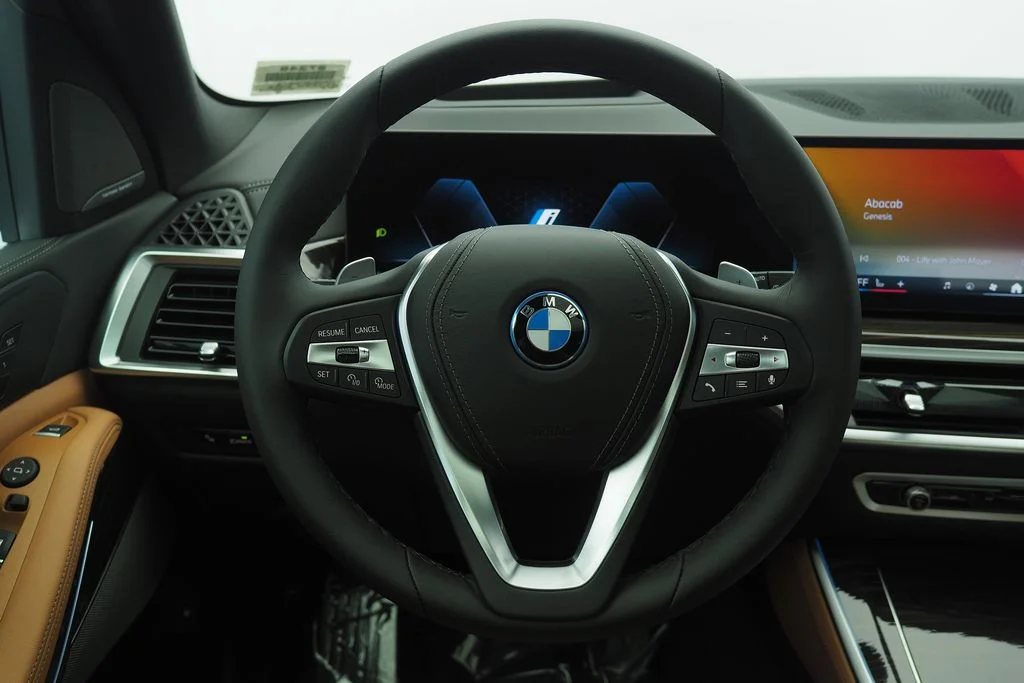 New 2026 Black Sapphire Metallic BMW xDrive50e image 12