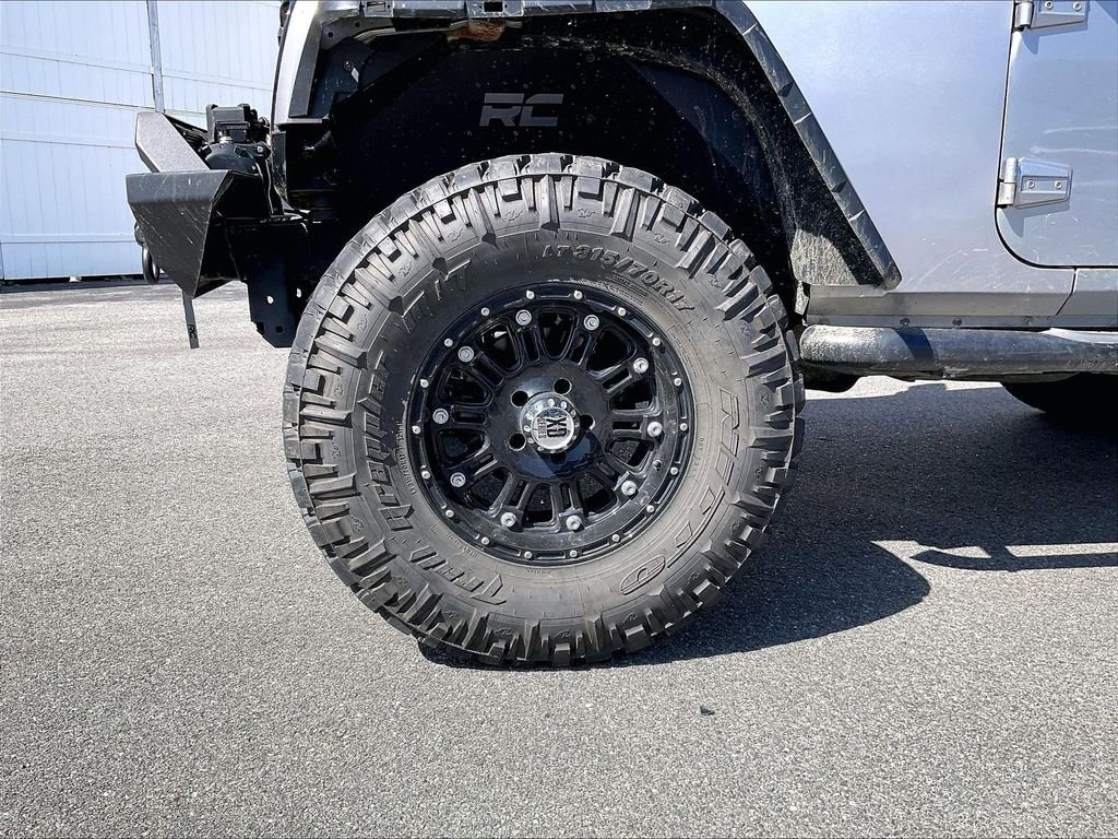 Used 2013 Billet Metallic Clearcoat Jeep Sport image 4