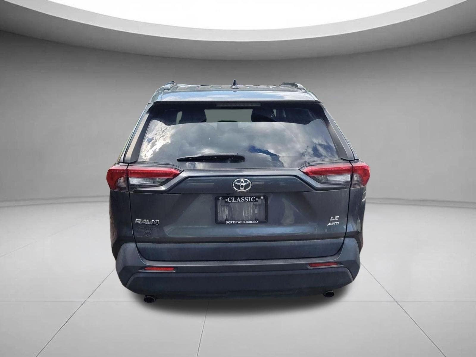 Used 2021 Magnetic Gray Metallic Toyota LE image 3