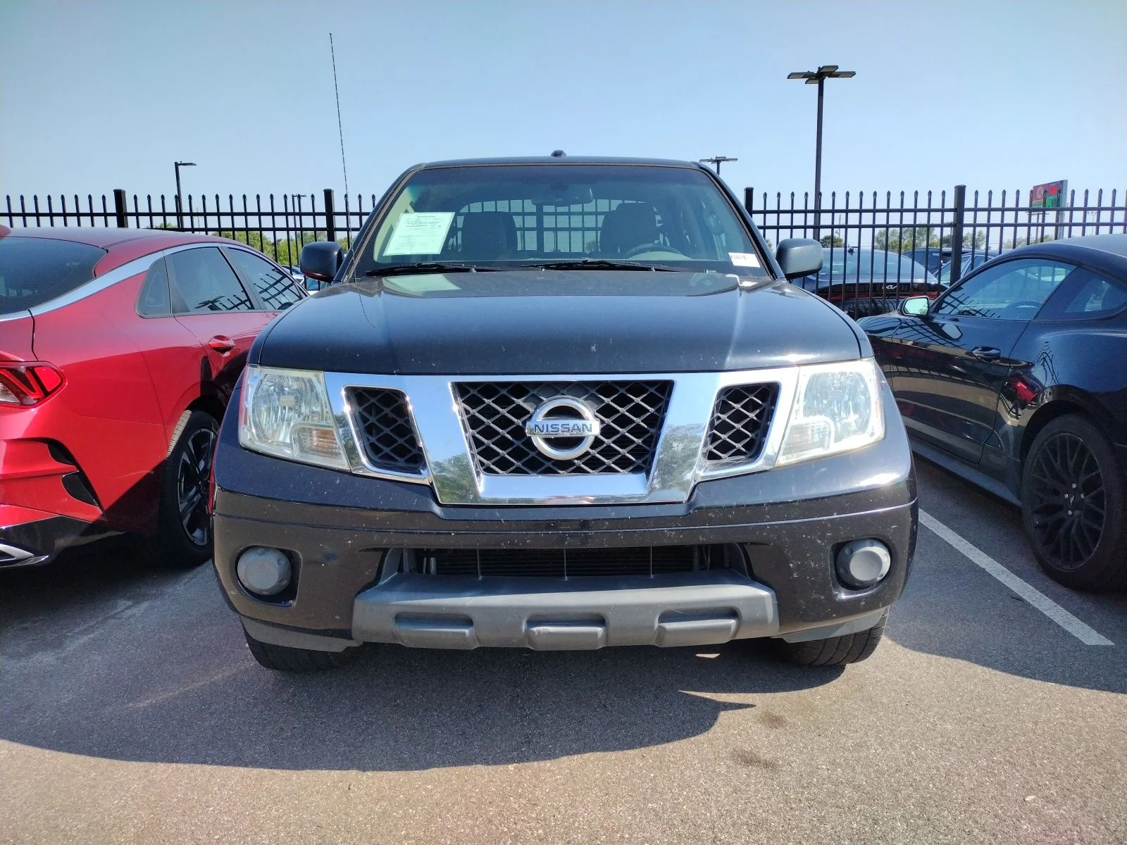 Used 2012 Black Nissan SV image 1
