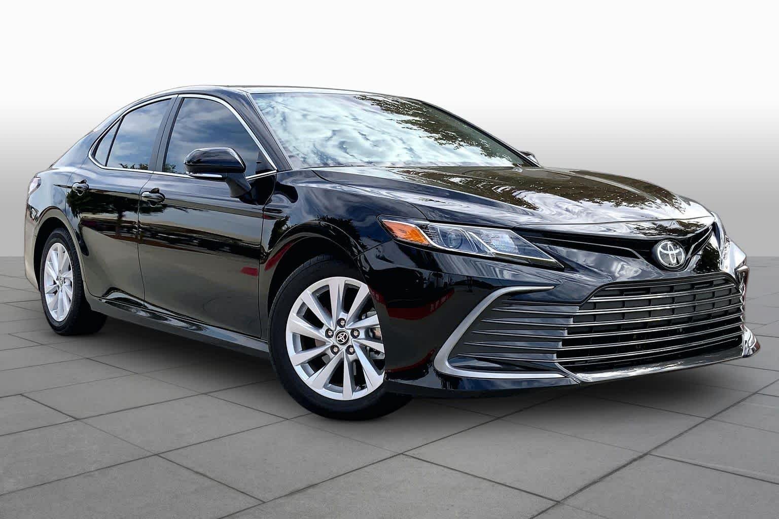 Used 2024 Midnight Black Metallic Toyota LE image 2