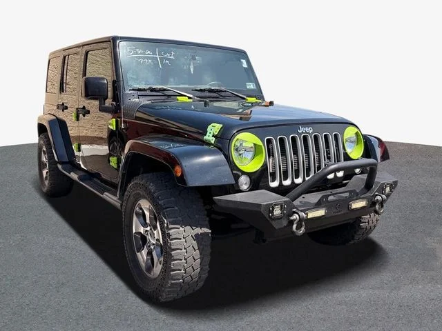 Used 2017 Black Jeep Unlimited Sahara image 4