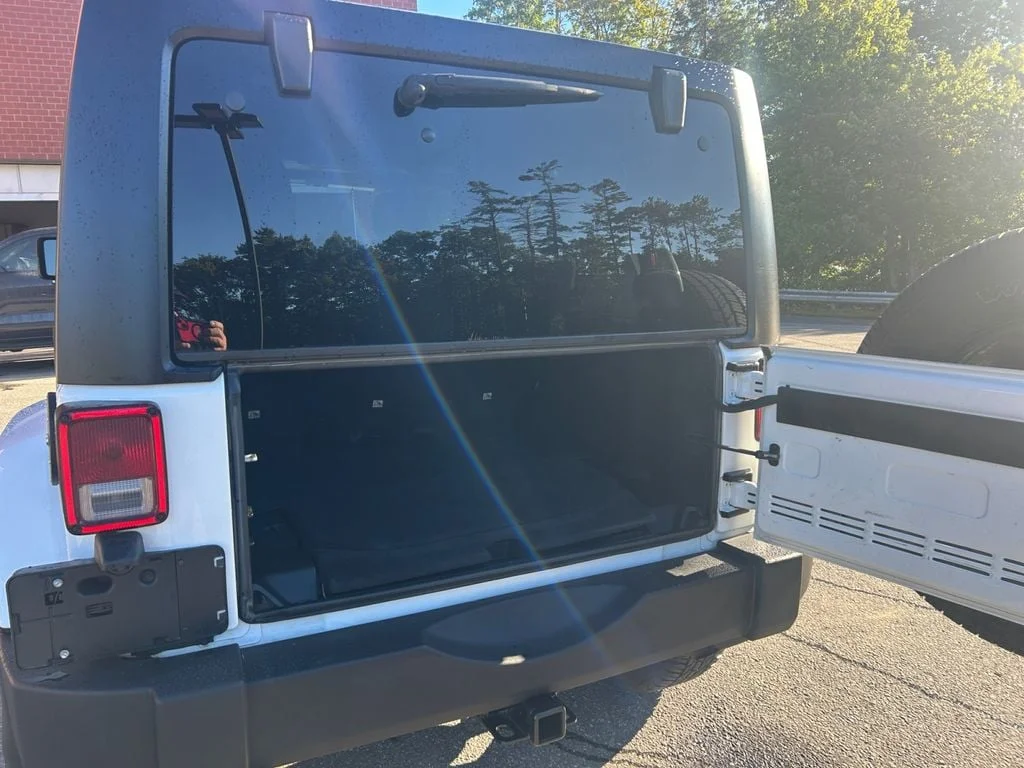 Used 2018 Bright White Jeep Unlimited Sahara 4x4 image 19