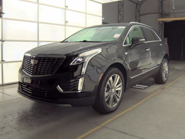 Used 2025 Black Cadillac Premium Luxury image 1