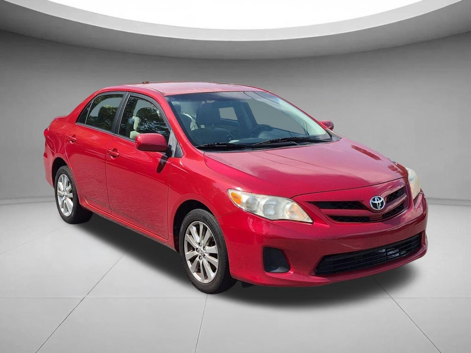 Used 2011 Barcelona Red Metallic Toyota LE image 7