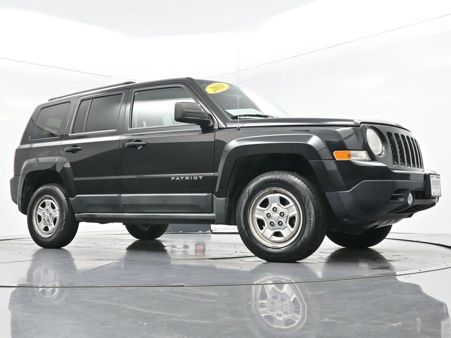 Used 2011 Brilliant Black Crystal Pearl Jeep Sport image 35
