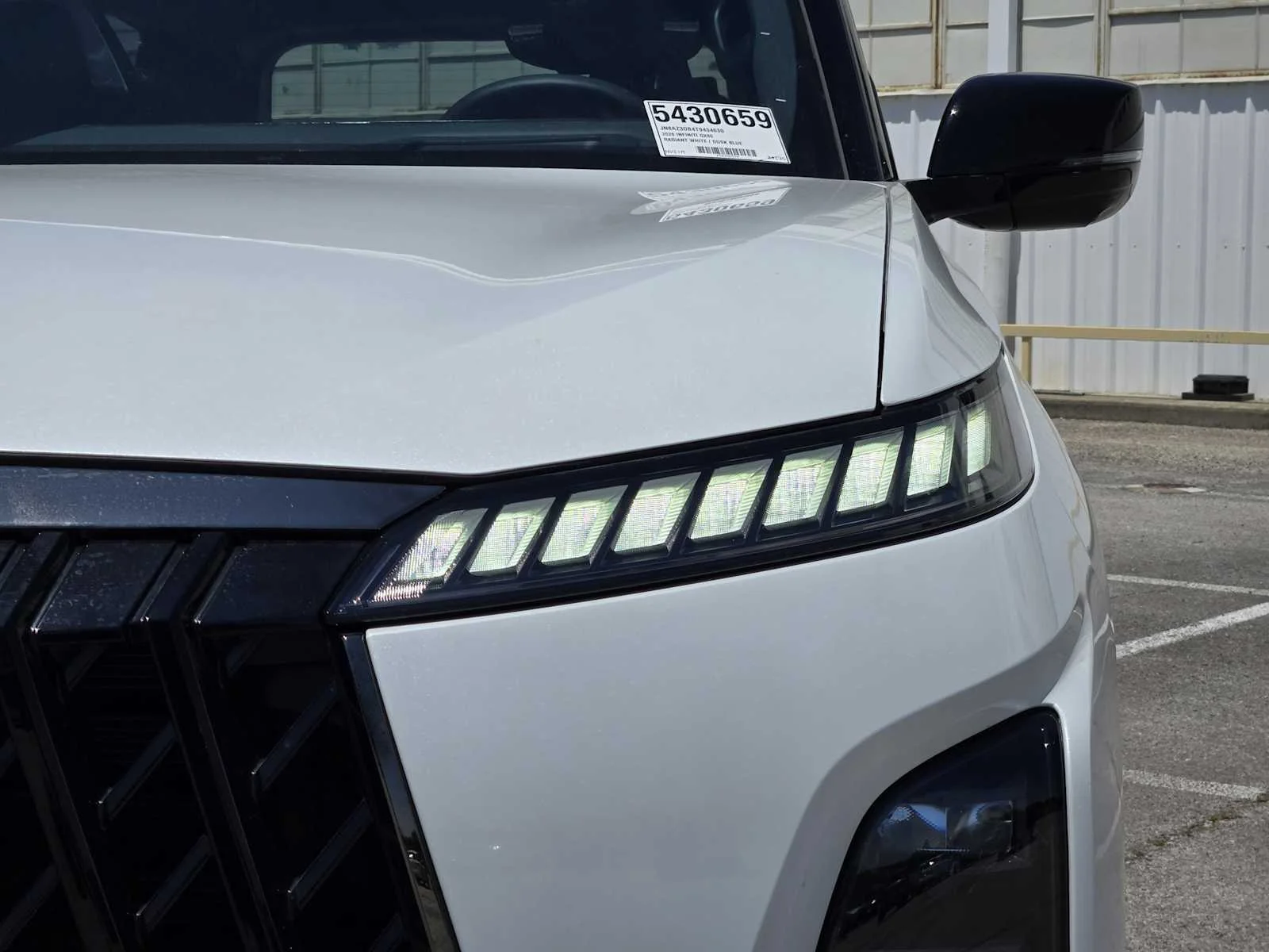 New 2026 RADIANT WHITE INFINITI Sport 4WD image 5