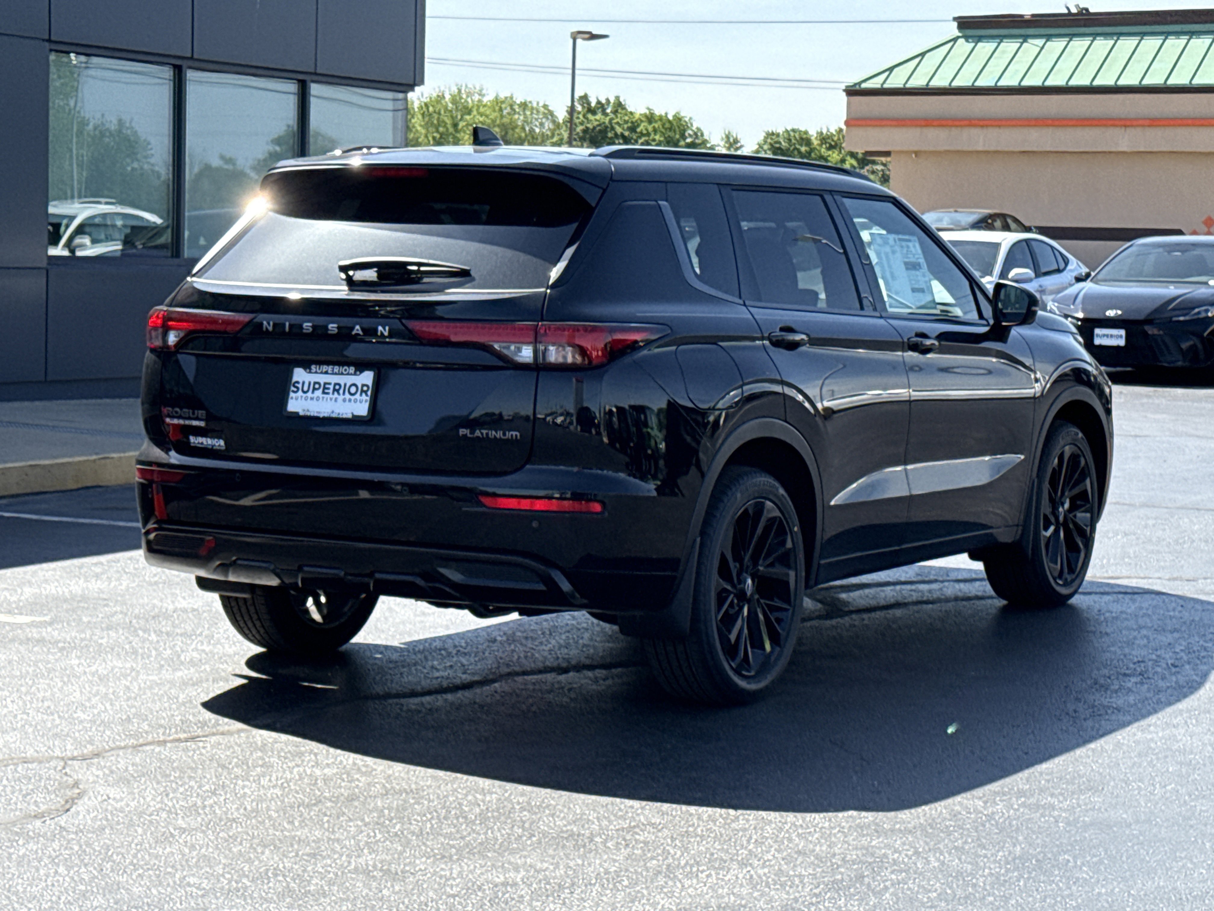 New 2026 Cosmic Black Nissan Platinum AWD image 3