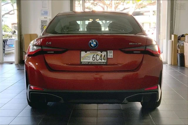 Used 2023 Sunset Orange Metallic BMW eDrive35 image 4