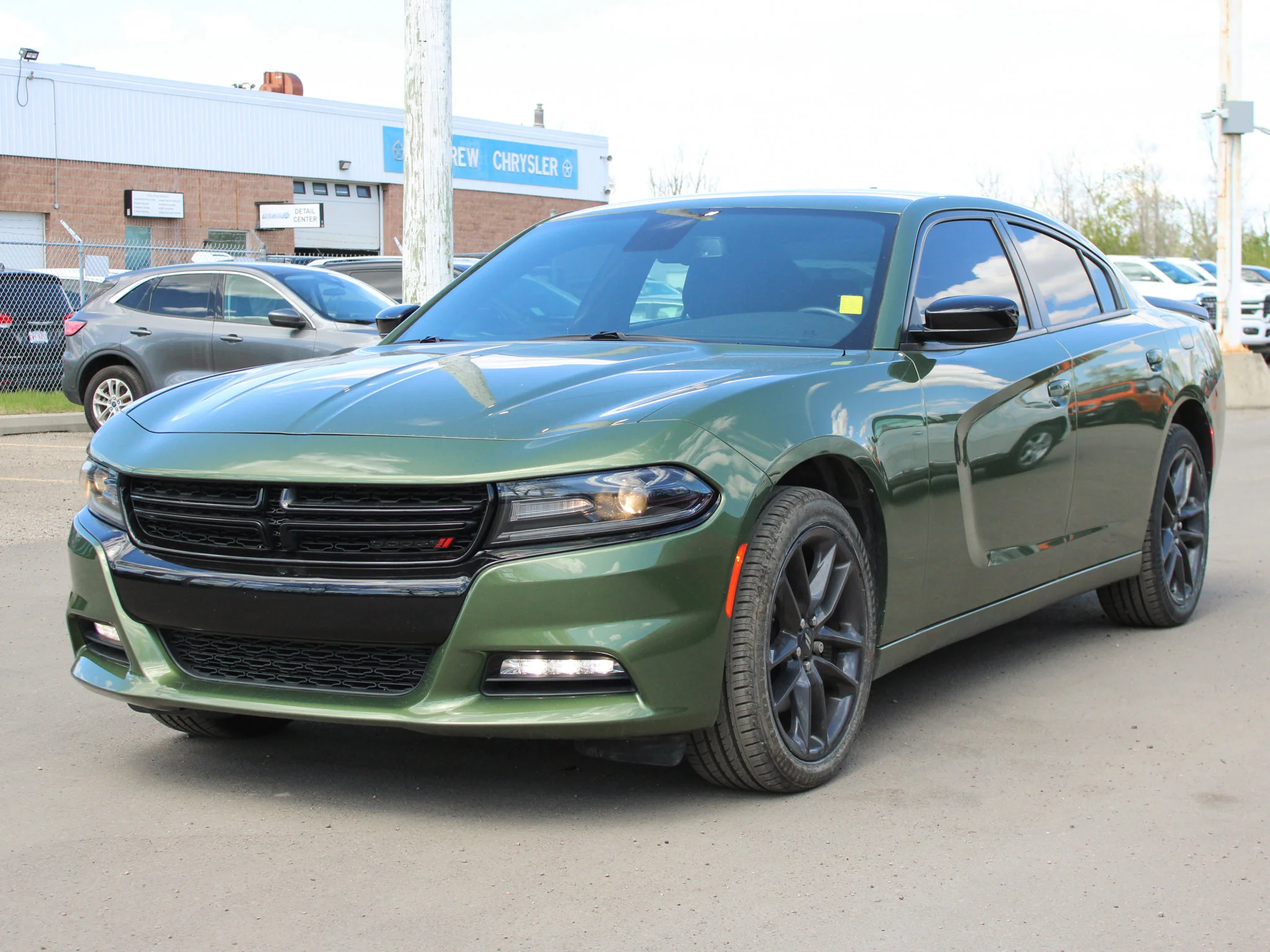 Certified Used 2021 Green Dodge SXT * 300HP V6 | Blacktop Package | Heated Seats | Navigation | F8 Green Metallic image 11