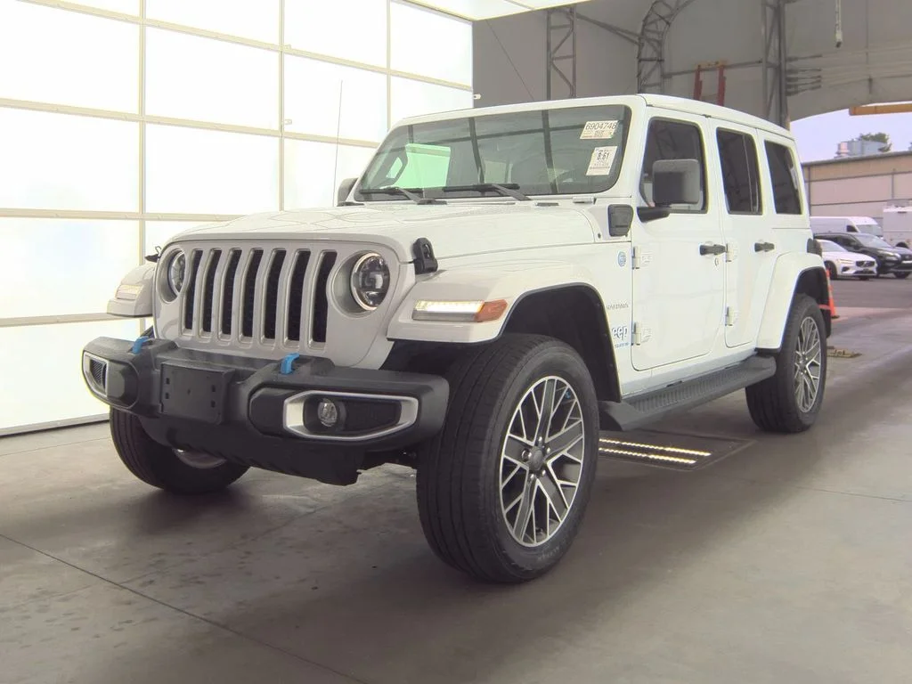 Used 2023 White Jeep Sahara 4xe image 1