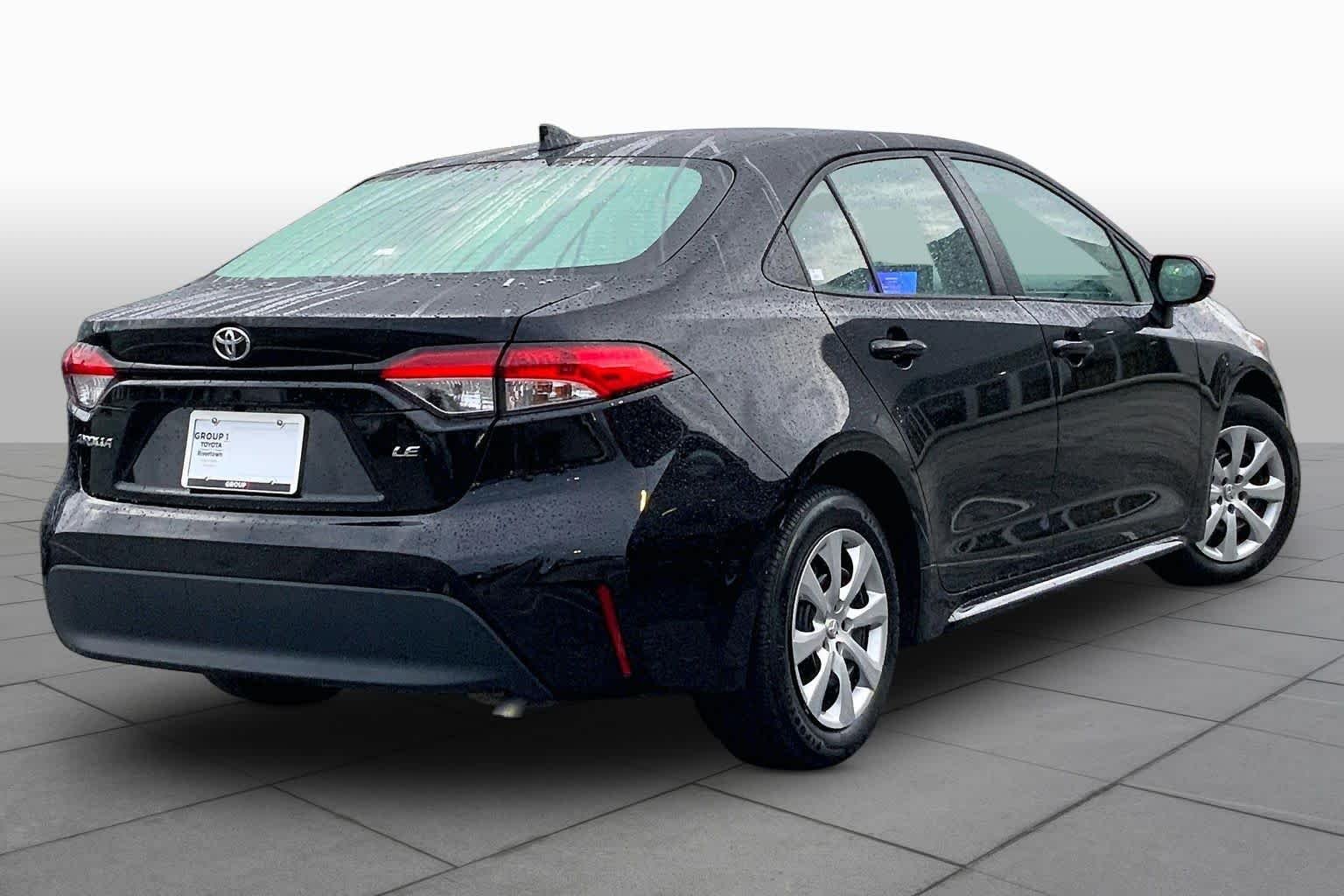 Used 2024 Midnight Black Metallic Toyota LE image 13