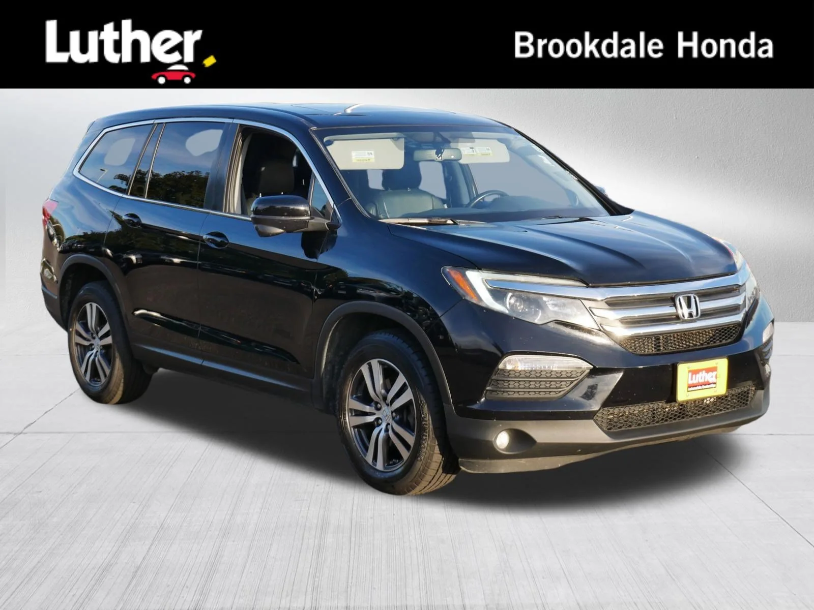 Used 2016 Crystal Black Pearl Honda EX-L image 1