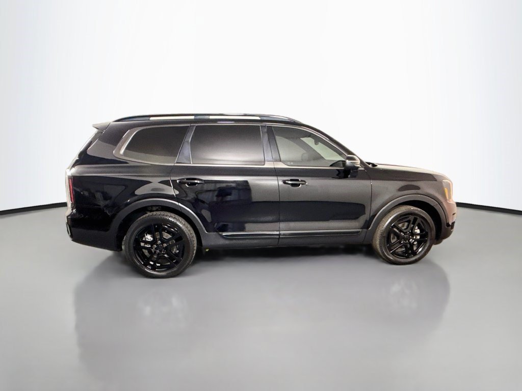 Used 2025 Ebony Black Kia EX X-Line image 8