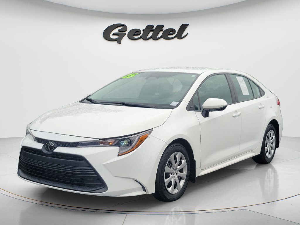 Used 2025 White Toyota LE image 1