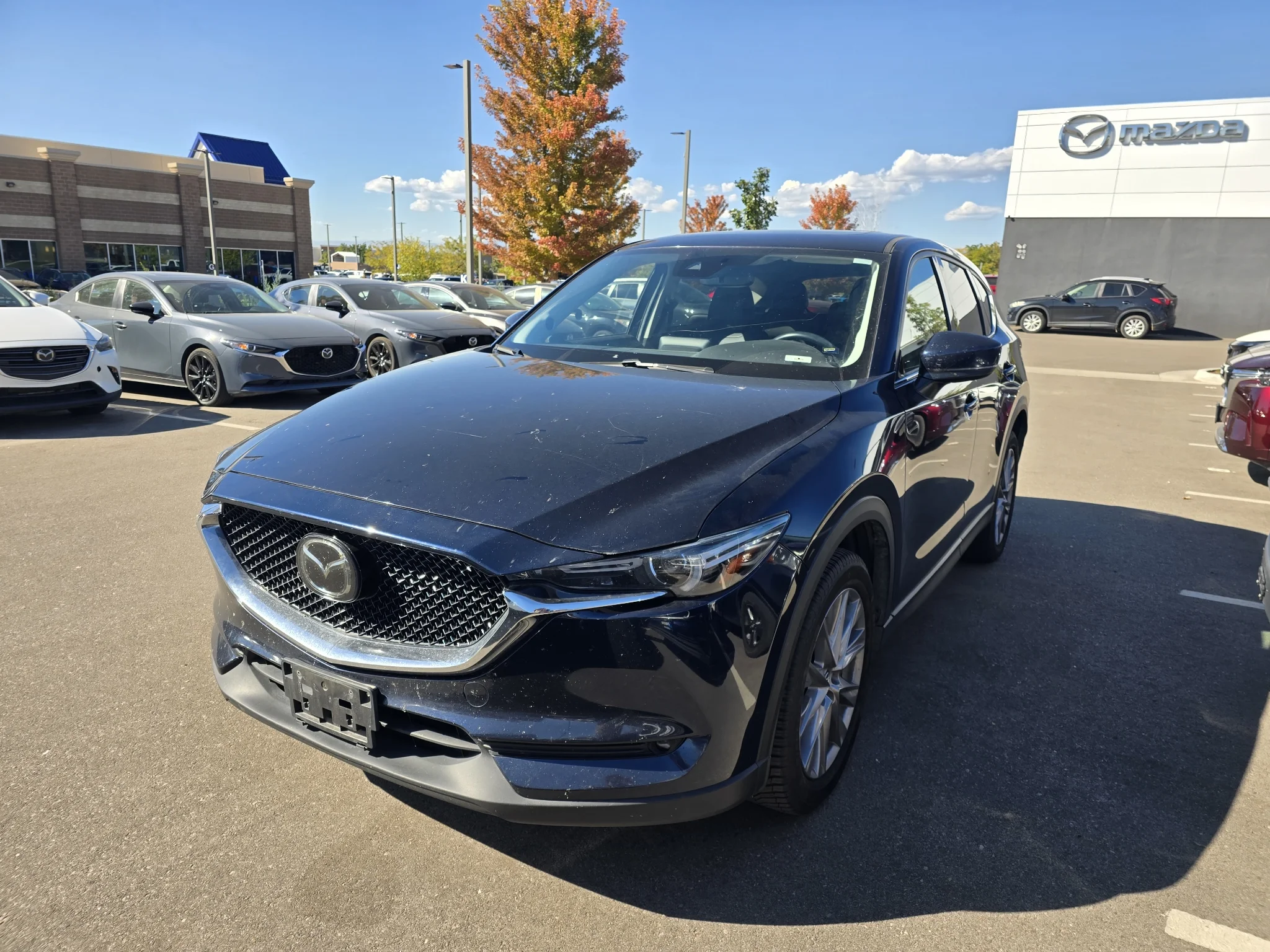 Used 2019 Deep Crystal Blue Mica Mazda Grand Touring image 1