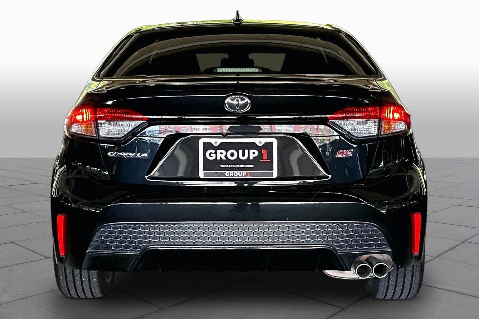 Used 2022 Black Sand Pearl Toyota SE image 4
