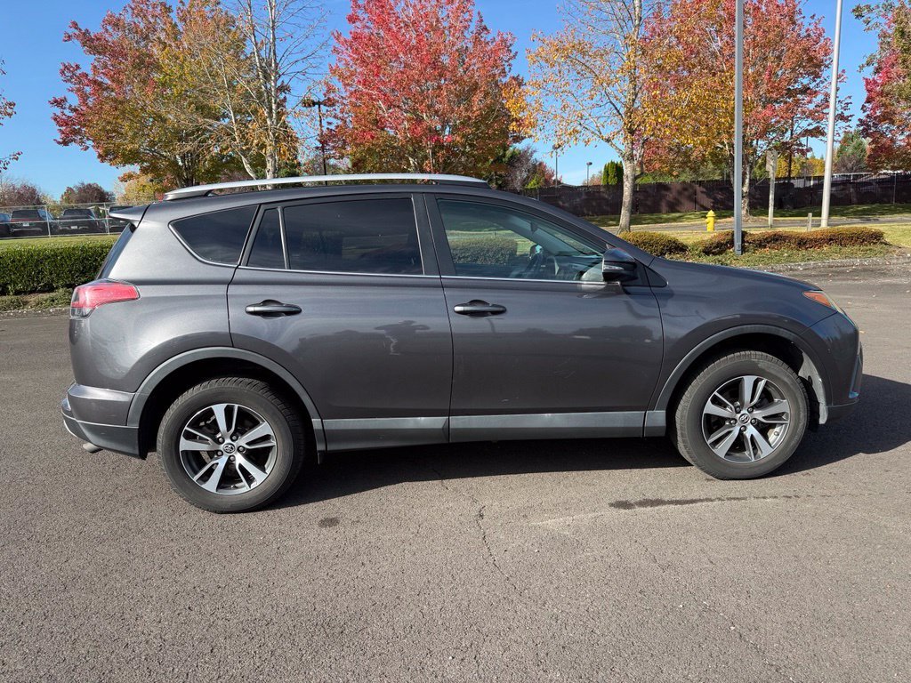 Used 2016 Magnetic Gray Metallic Toyota XLE image 8