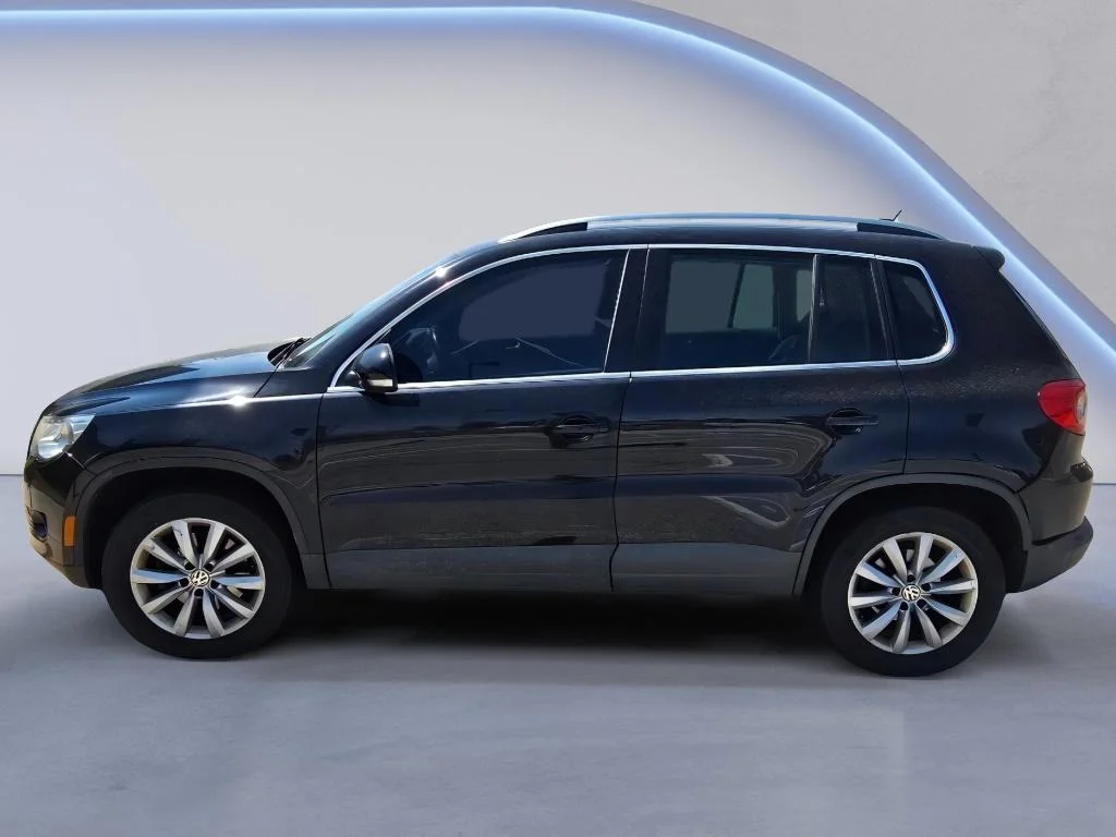 Used 2011 Deep Black Metallic Volkswagen SE 4Motion image 2