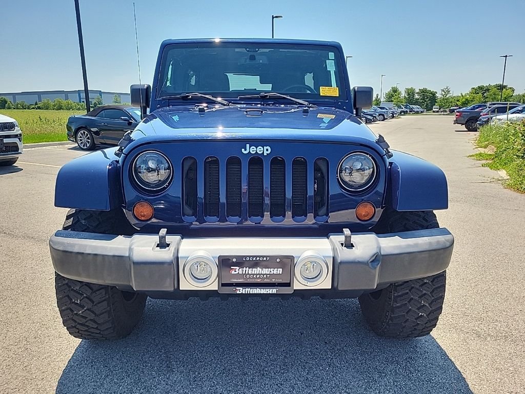Used 2013 Blue Jeep Unlimited Sahara image 8