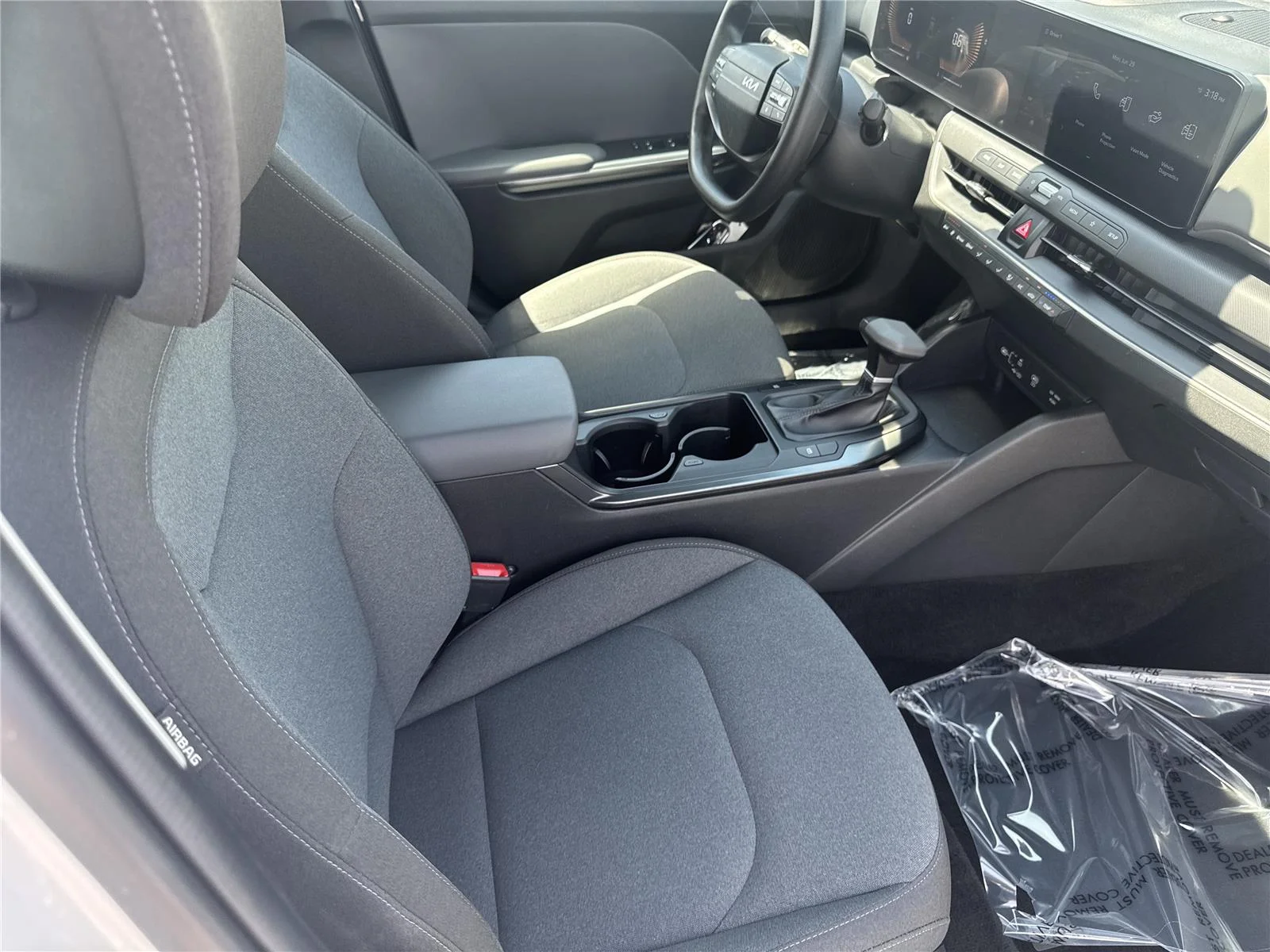 Used 2025 Snow White Pearl Kia LXS image 33