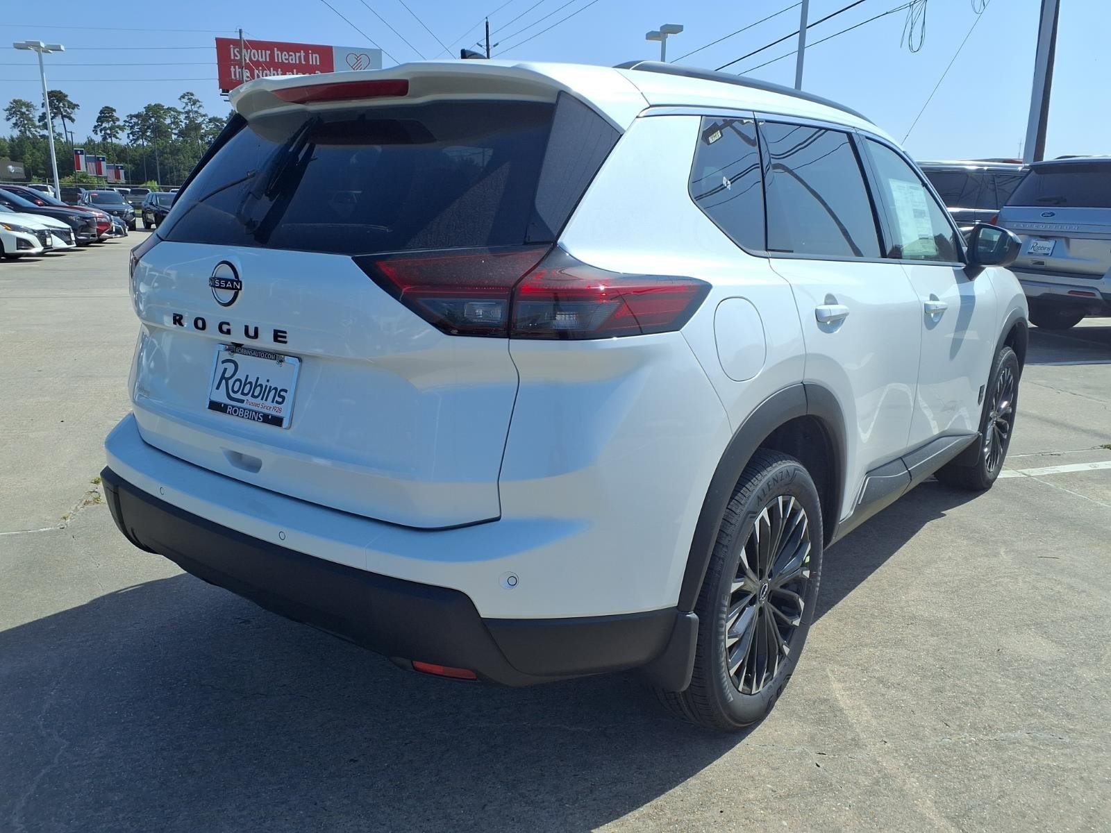 2026 Nissan Rogue Dark Armor™ White at Robbins Nissan