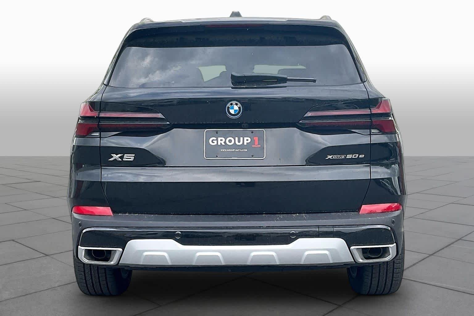 Used 2026 Black Sapphire Metallic BMW xDrive50e image 4