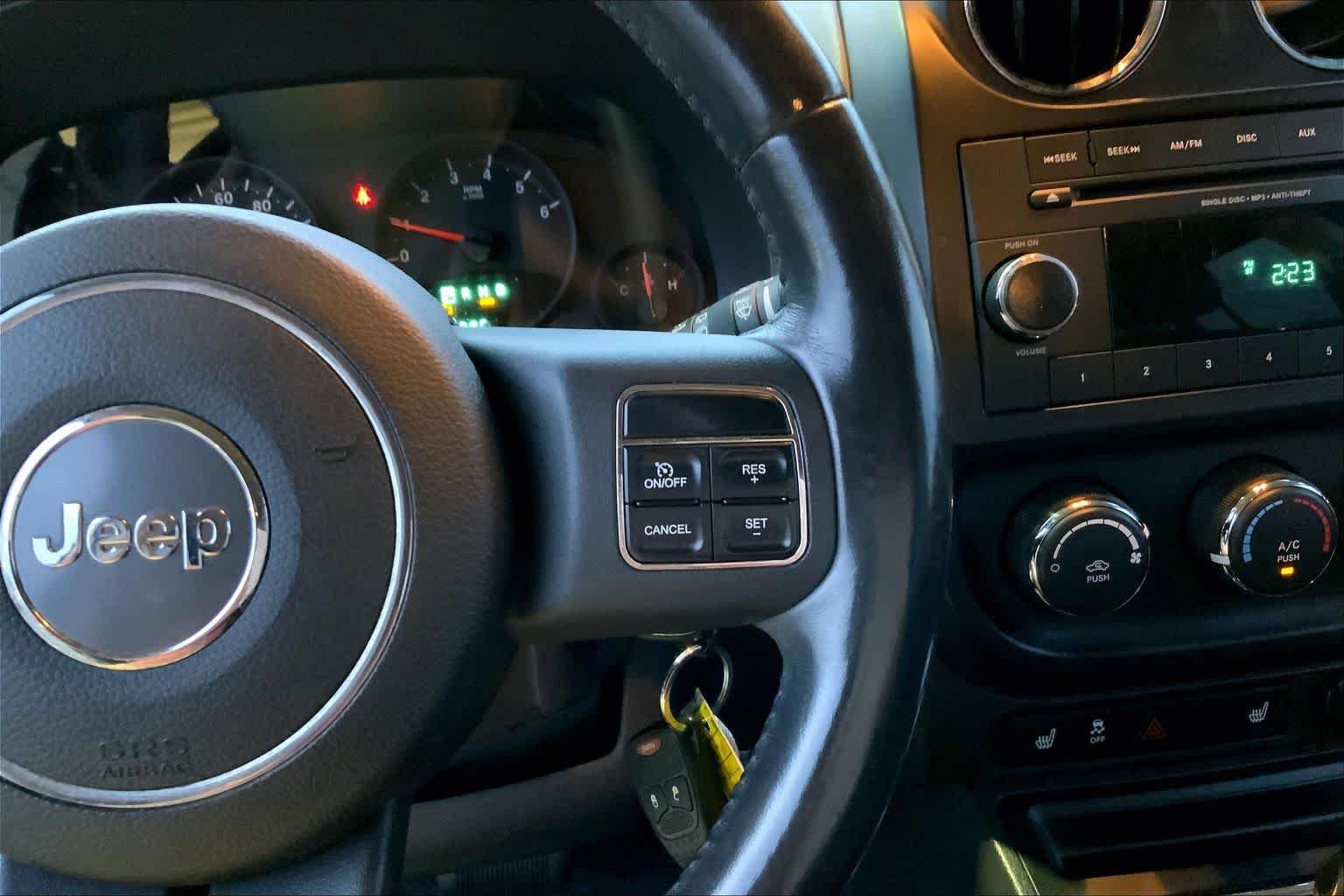 Used 2011 Dark Charcoal Pearl Jeep Latitude image 23