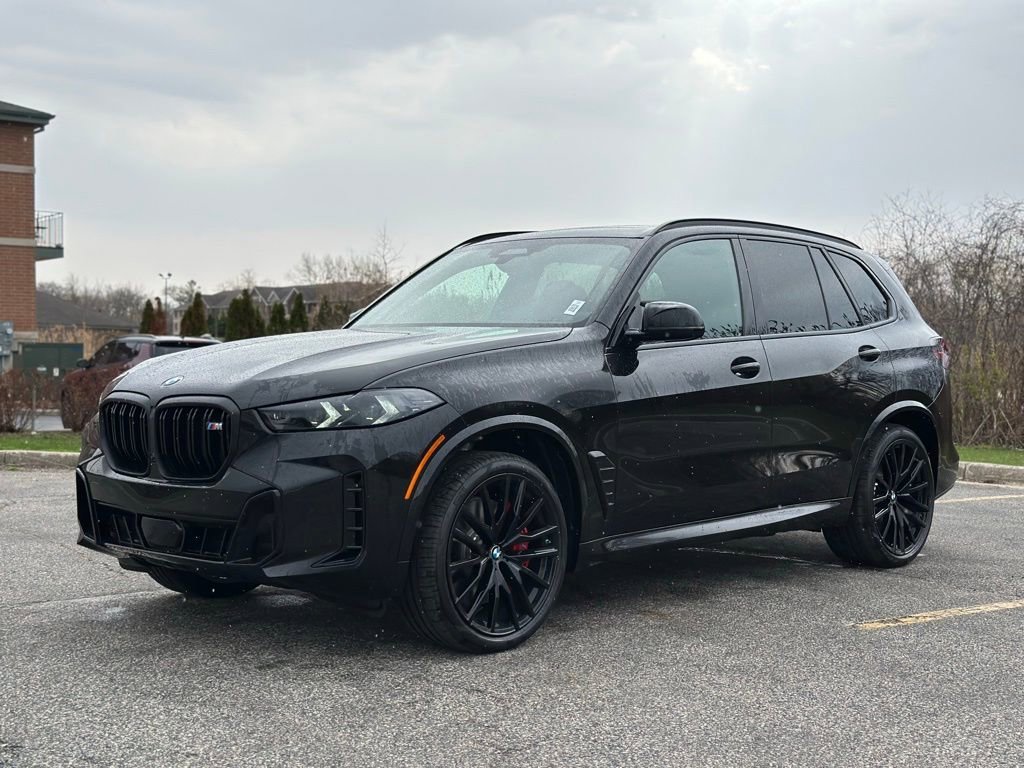 New 2026 Black Sapphire Metallic BMW M60i image 3