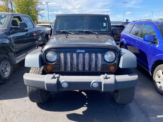 Used 2013 Black Jeep Unlimited Sport image 6