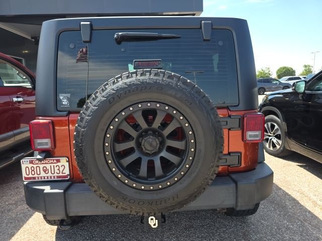 Used 2014 Orange Jeep Sport image 4