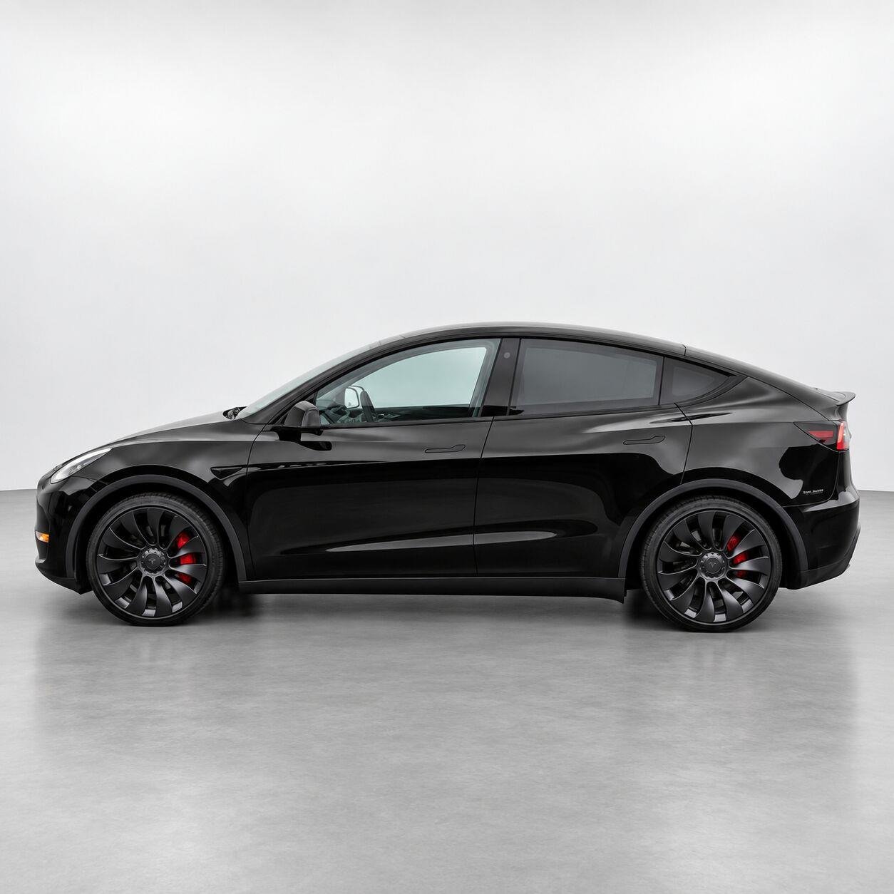Used 2022 Solid Black Tesla Performance image 2