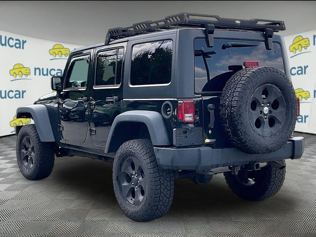 Used 2017 Black Clearcoat Jeep Unlimited Sport image 4