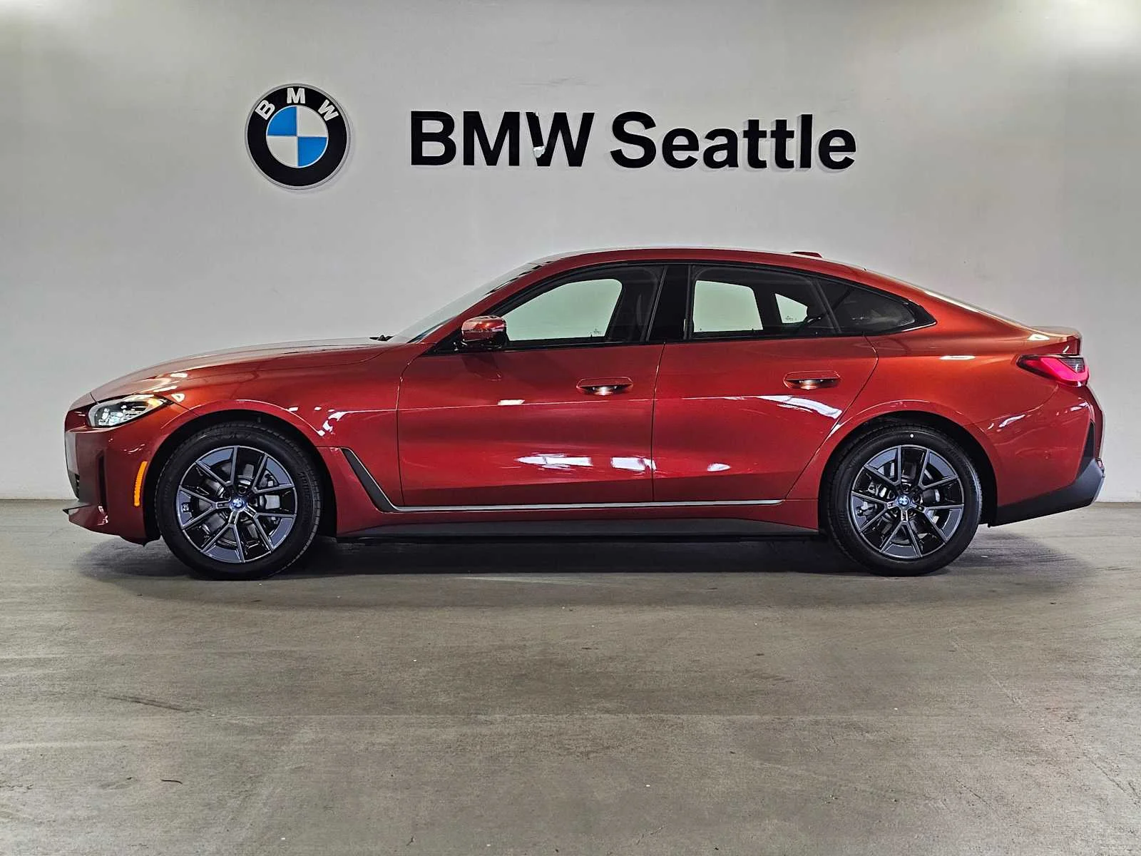 Certified Used 2023 Sunset Orange Metallic BMW eDrive35 image 3