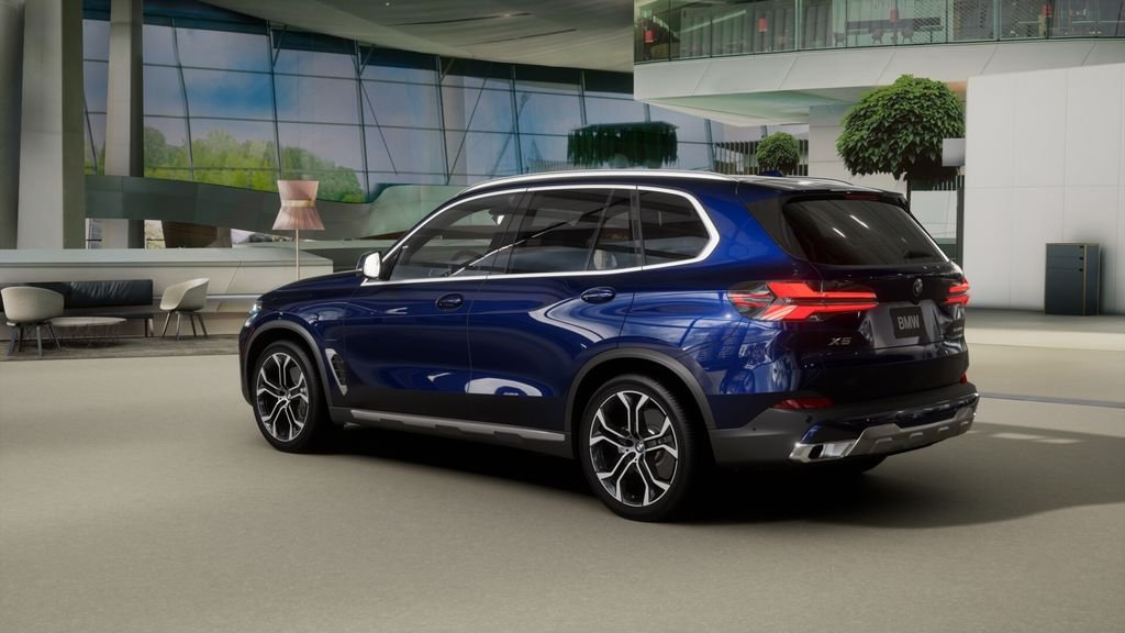 New 2026 Tanzanite Blue II Metallic BMW xDrive50e image 27