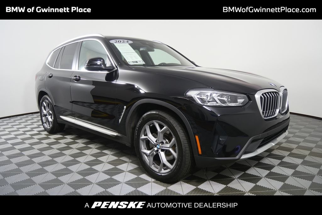 Certified Used 2024 Jet Black BMW sDrive30i image 1