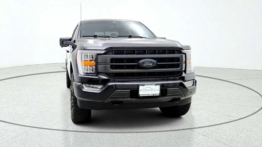 Used 2023 Agate Black Metallic Ford LARIAT 4WD SuperCrew 5.5