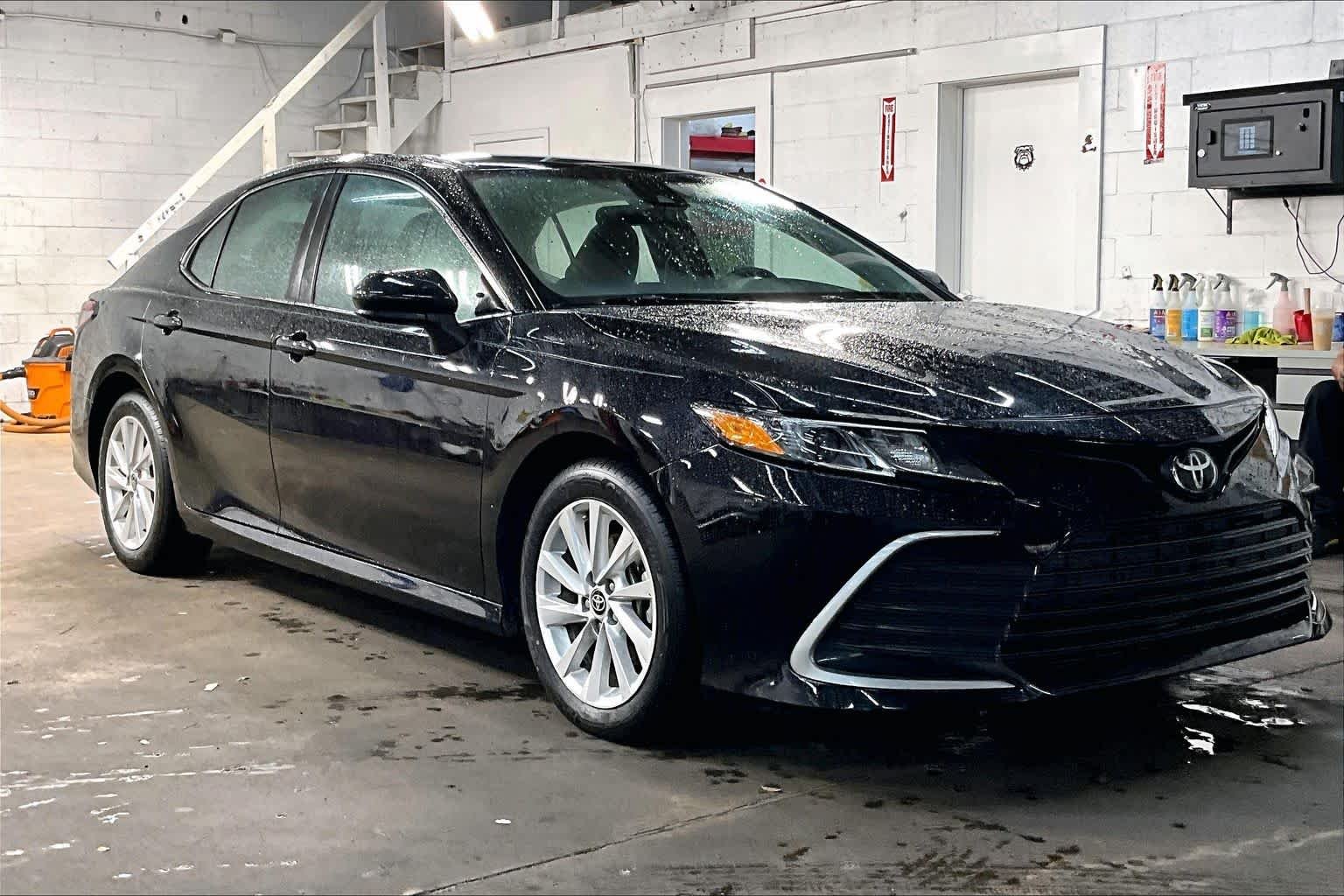 Used 2024 Midnight Black Metallic Toyota LE image 3