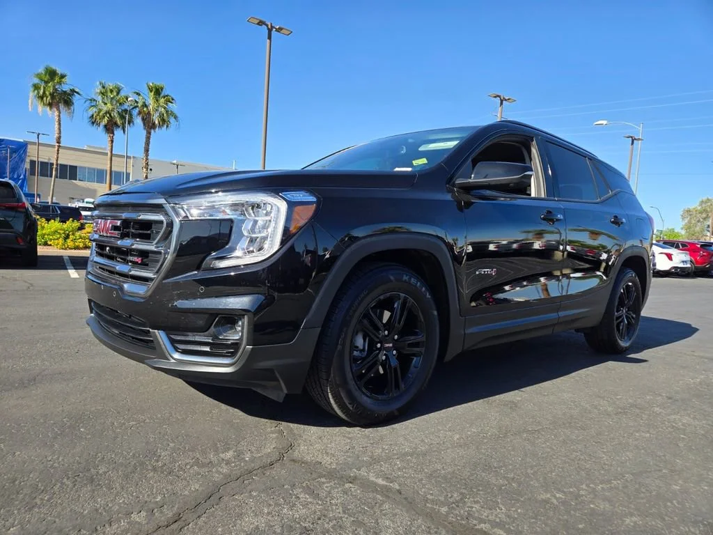 Used 2023 Ebony Twilight Metallic GMC AT4 image 2