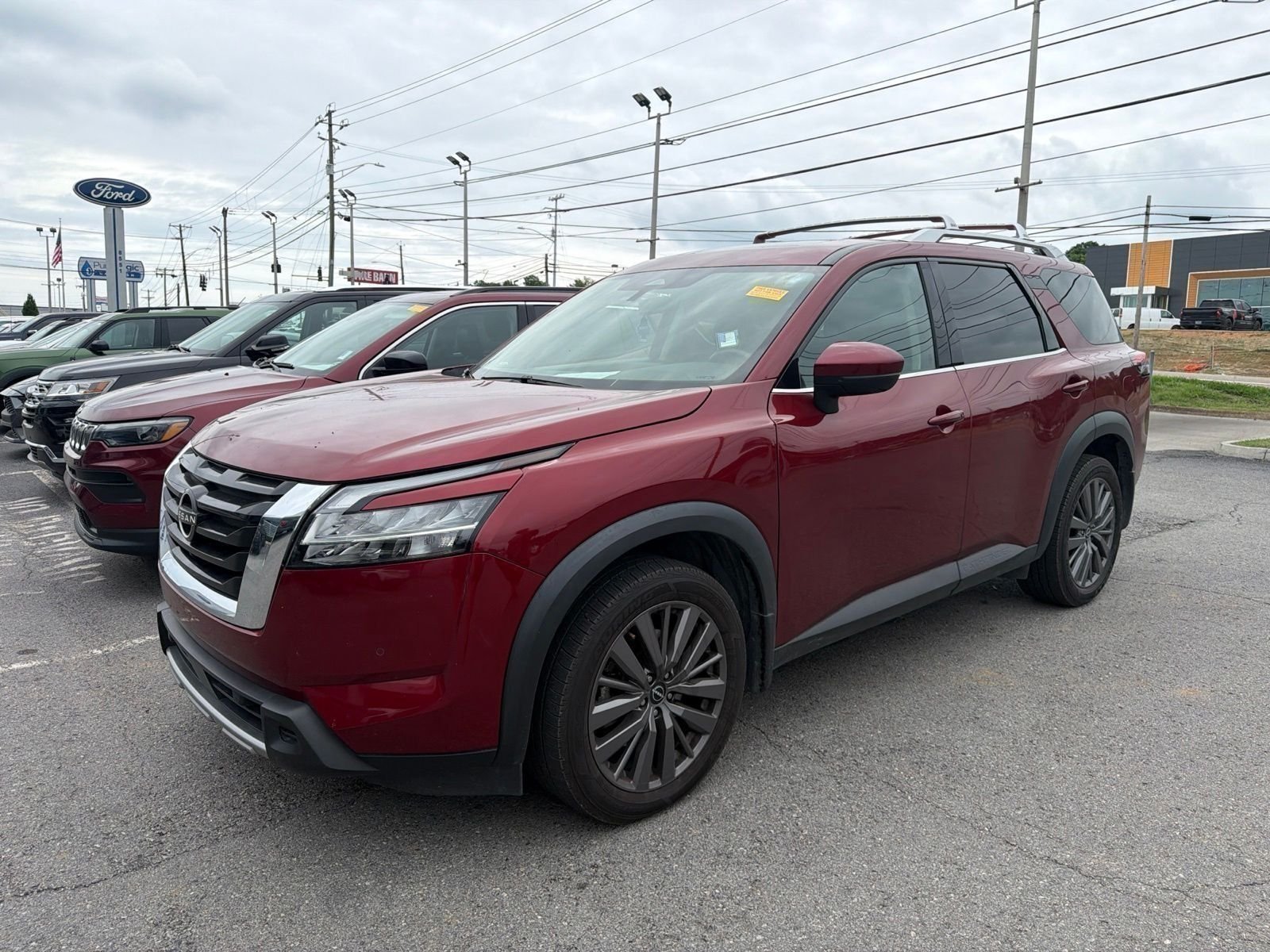 Used 2023 Scarlet Ember Nissan SL image 1
