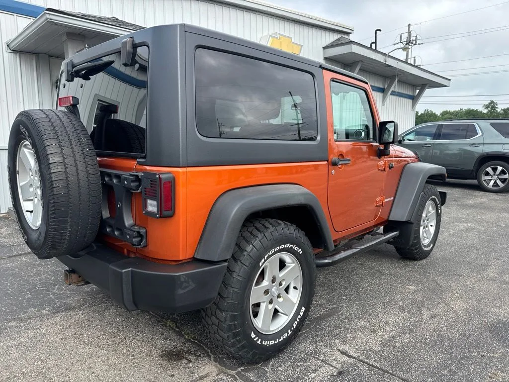 Used 2011 Orange Jeep Rubicon image 7