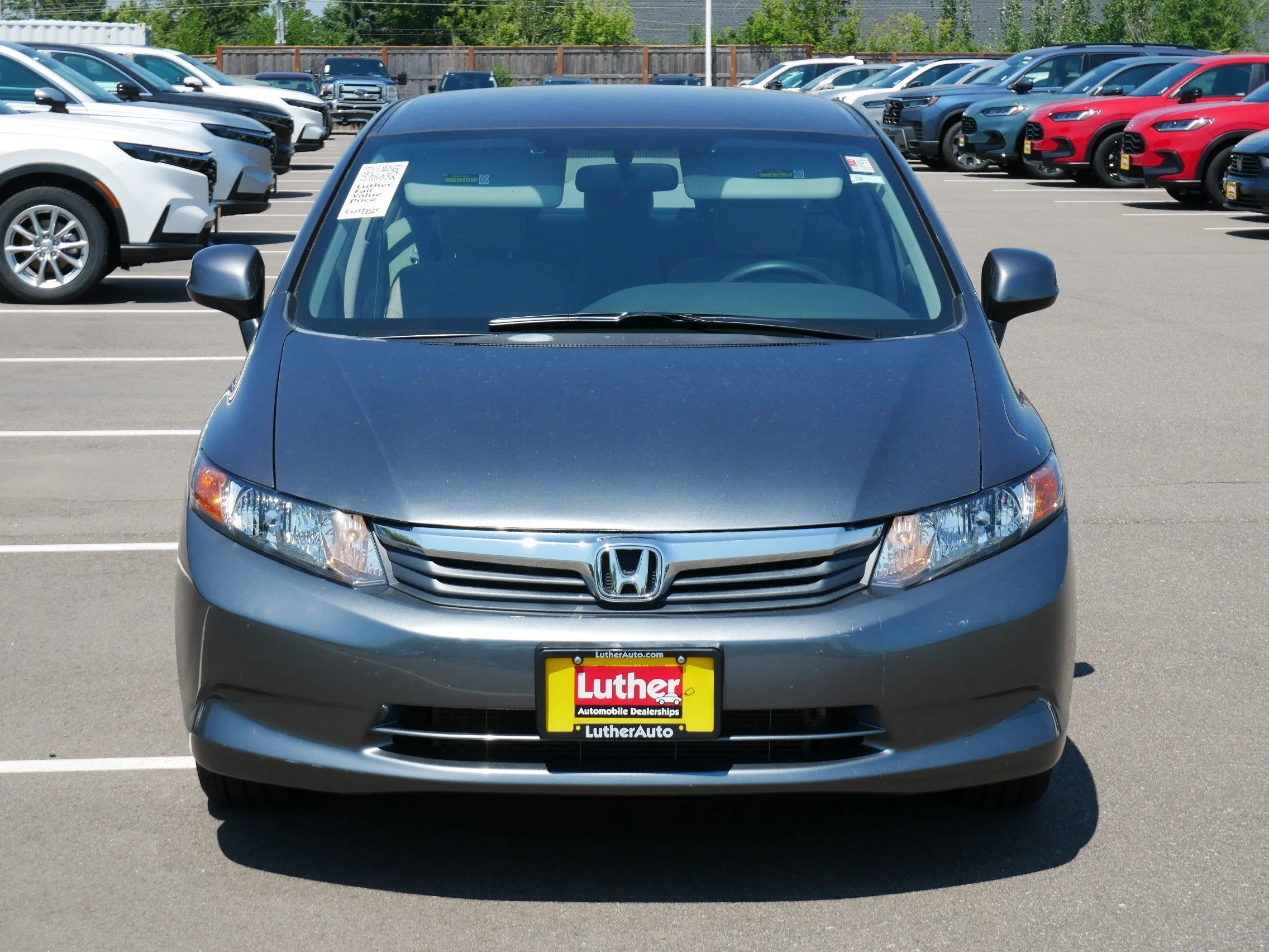 Used 2012 Honda Civic LX with VIN 2HGFB2F59CH579171 for sale in Hopkins, MN