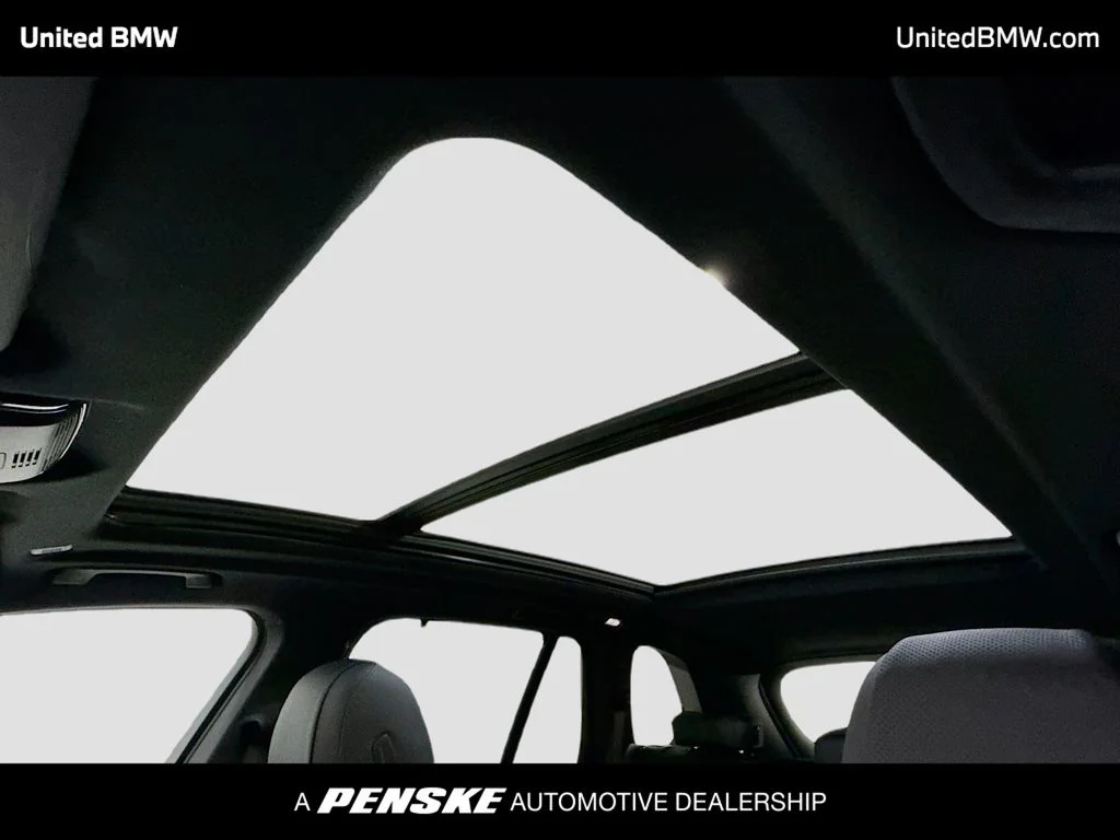 New 2026 Mineral White Metallic BMW xDrive50e image 12