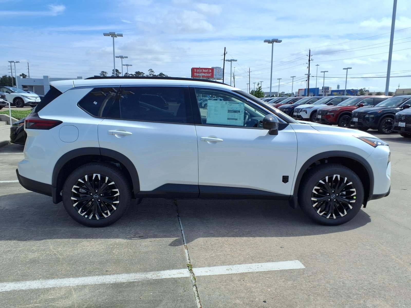 2026 Nissan Rogue Dark Armor™ White at Robbins Nissan