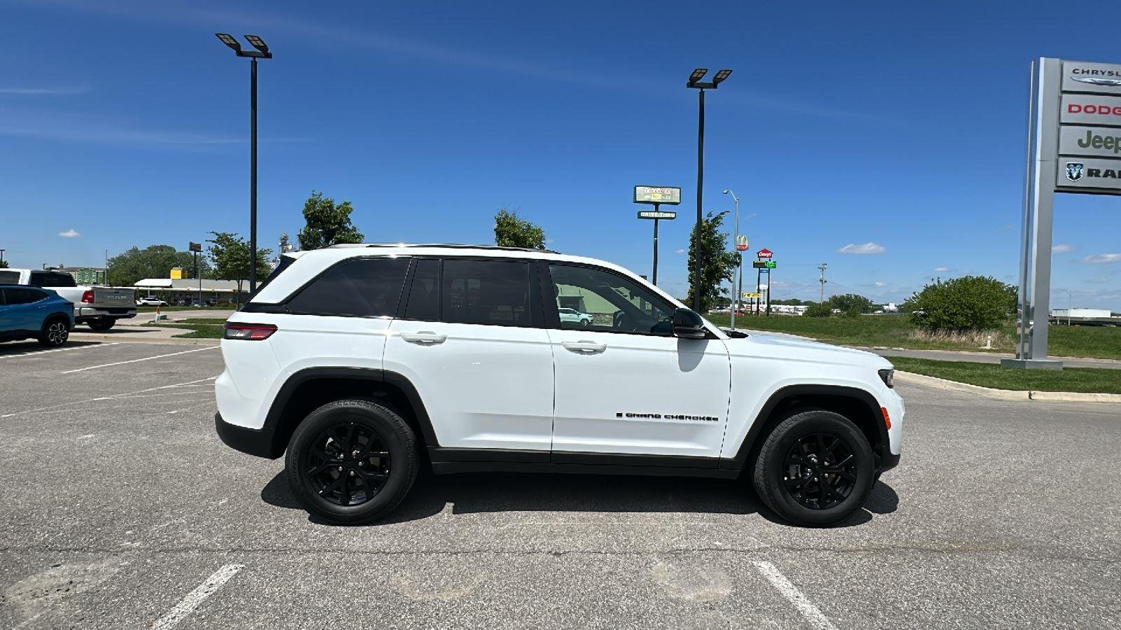 Used 2025 Bright White Clearcoat Jeep Altitude image 4