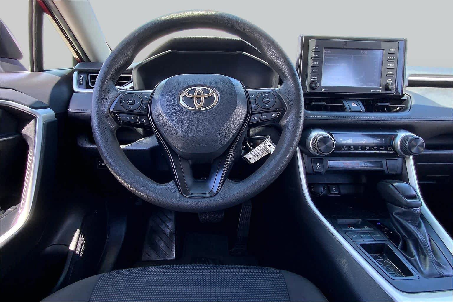 Used 2021 Ruby Flare Pearl Toyota LE image 6